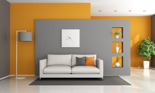 Grey and orange feature wall in a prepped living room ready for finish coats